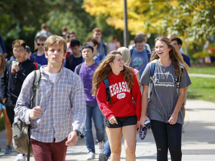 Lexi Wolfe and Emma Schumacher talk while walking near Hamilton Hall on their way back from class.