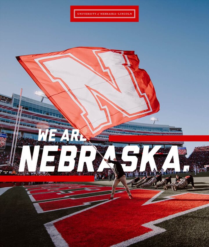 We Are Nebraska game day photo with N logo9 flag