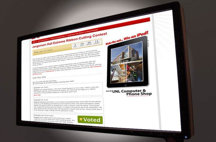 Photo of a monitor with a UNL website displayed.