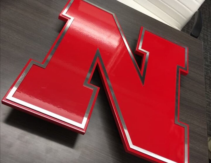 Close up of metal N logo sign